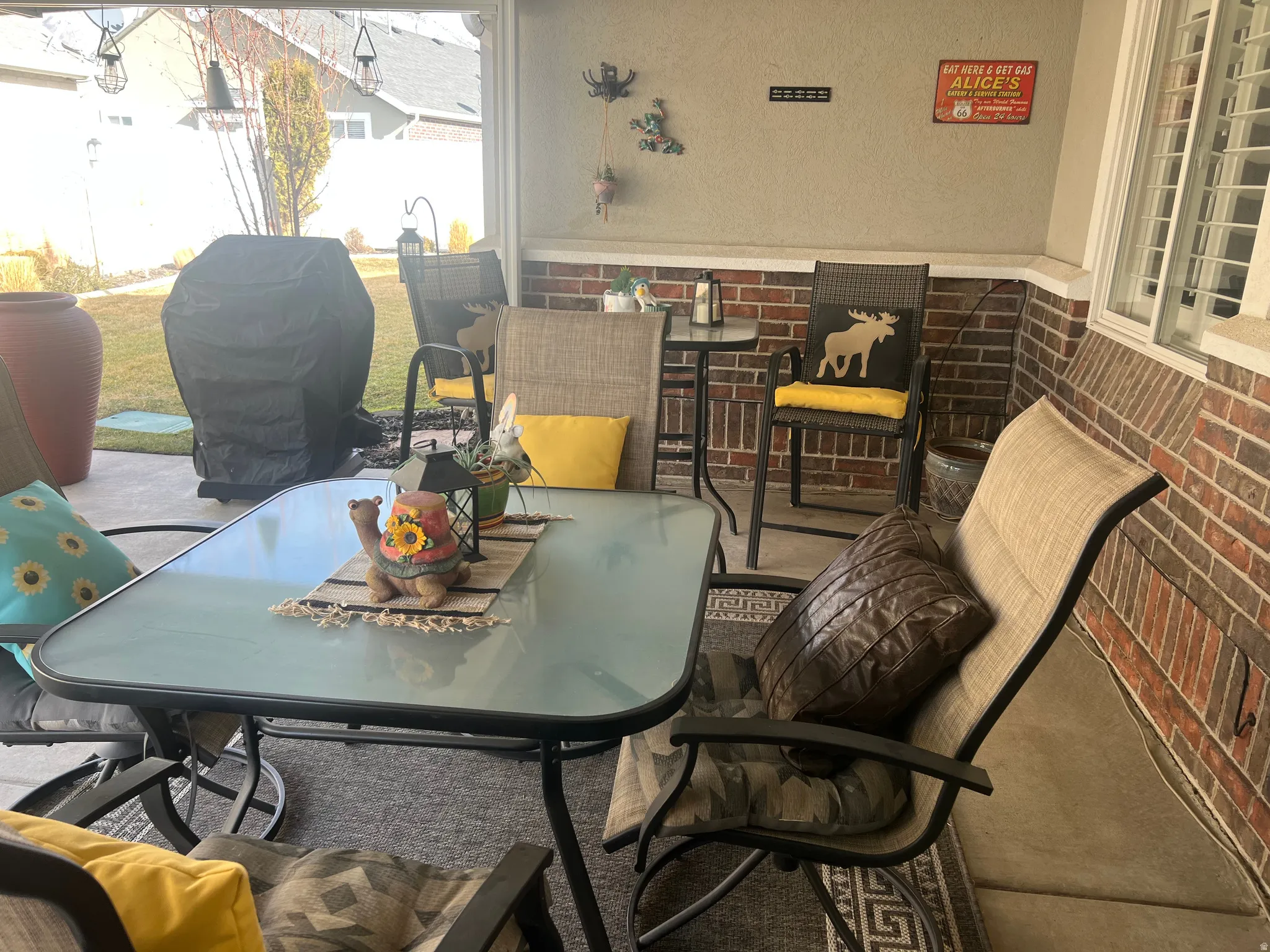 View of patio / terrace featuring outdoor dining space and grilling area