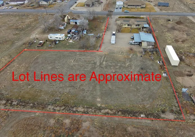 Aerial perspective of suburban area with property parcel outlined