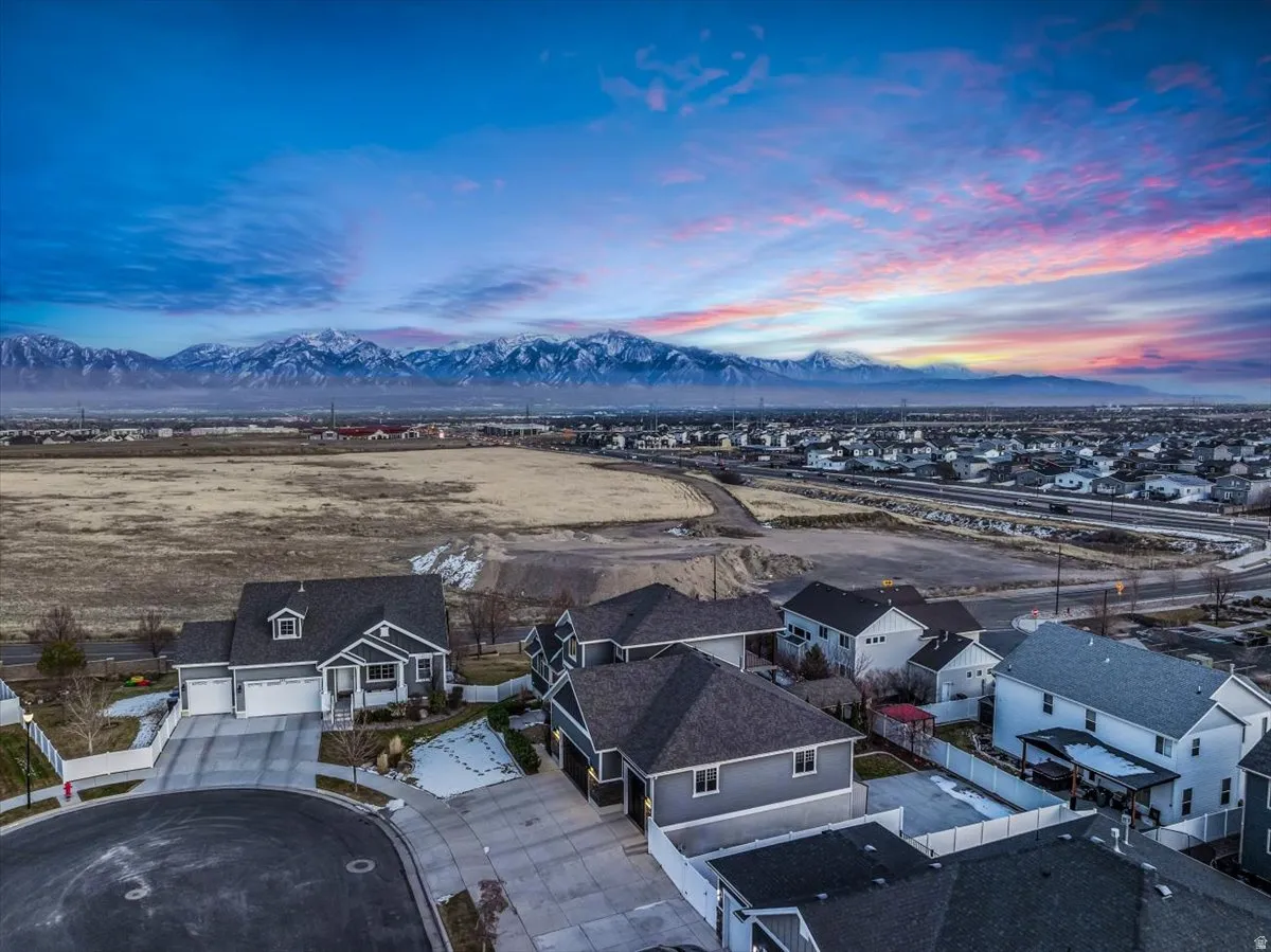 Aerial perspective of suburban area with mountains