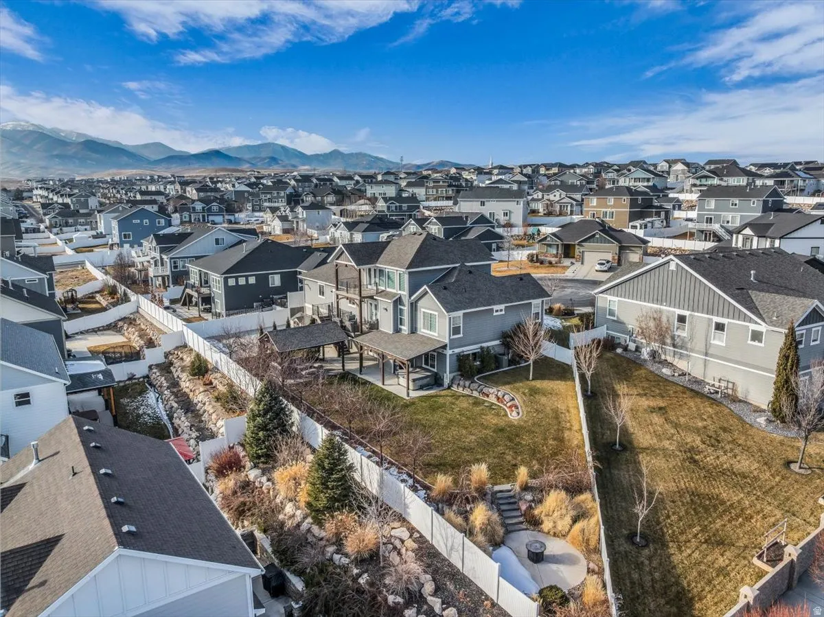 Aerial view of residential area with mountains