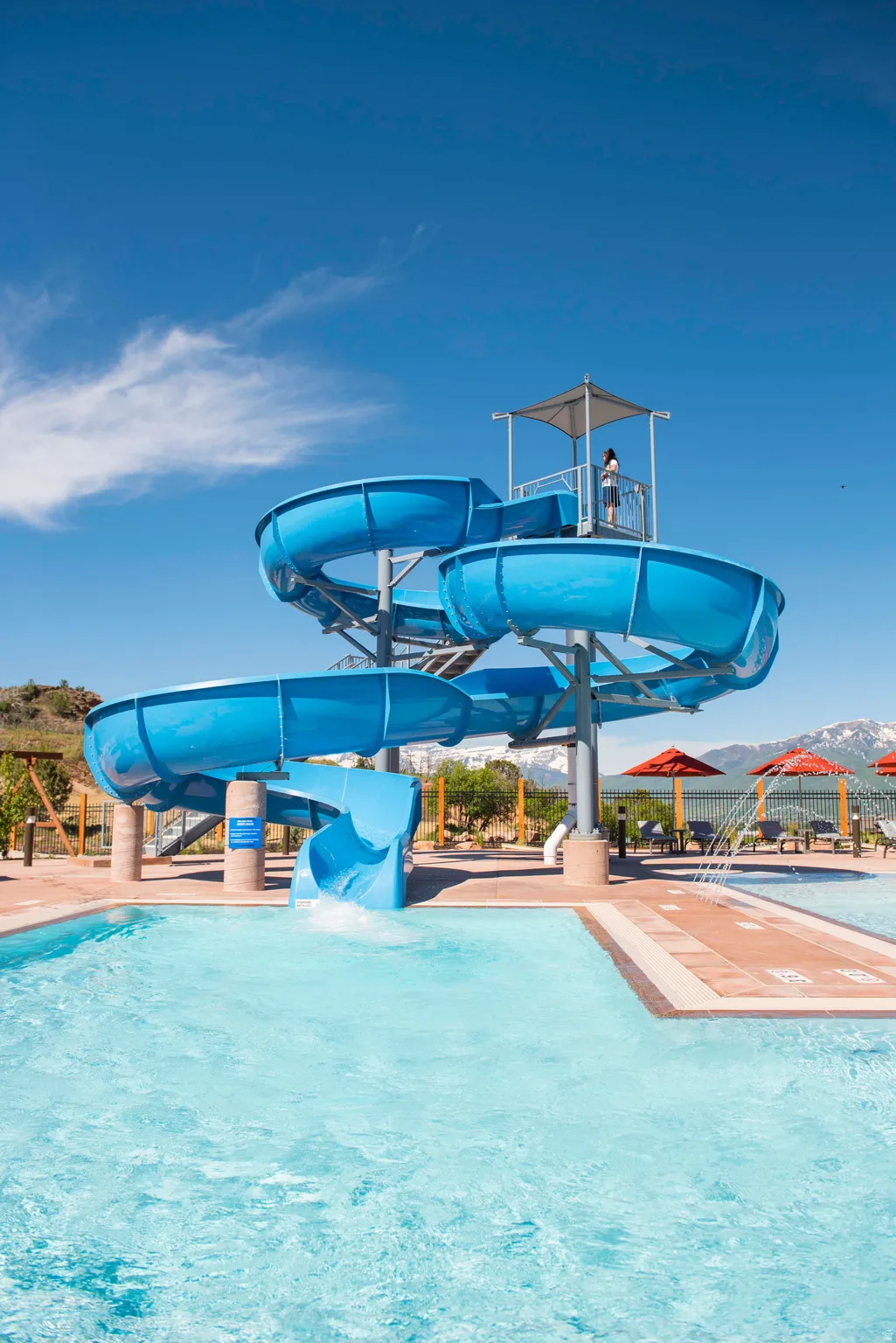 Community pool with a water slide
