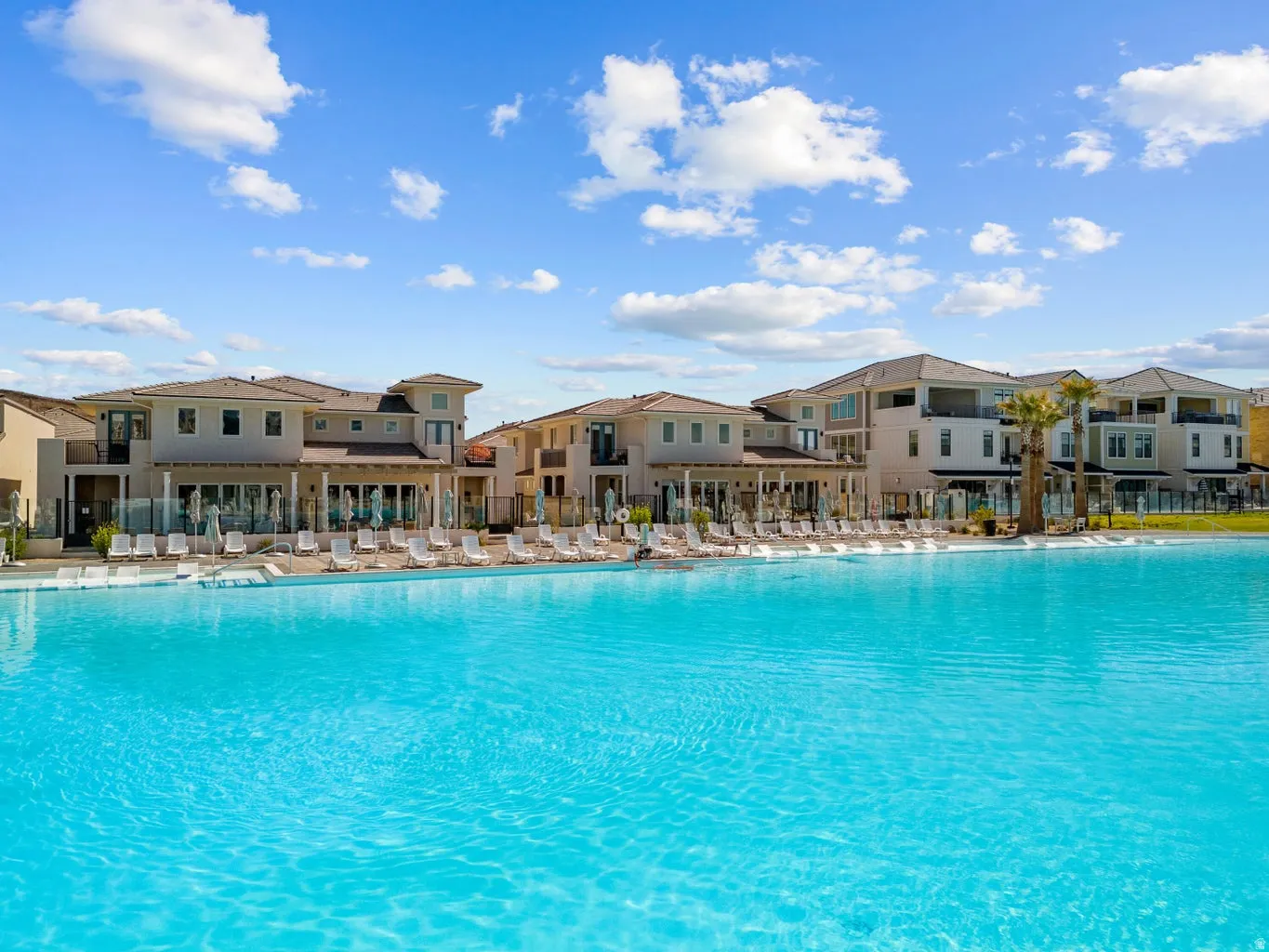 Community pool with a patio area