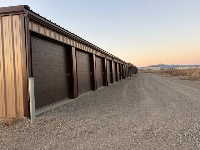 View of garage at dusk
