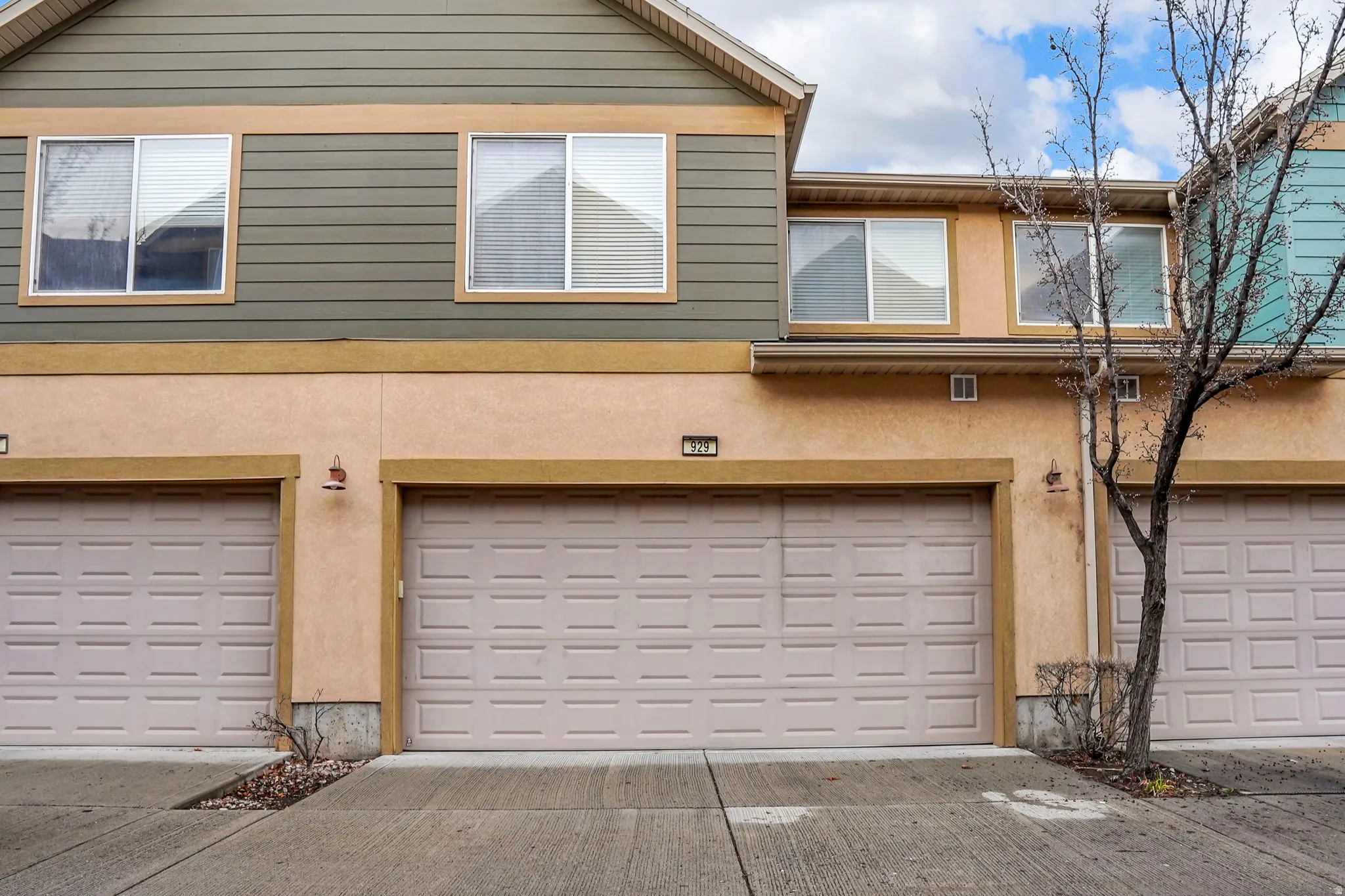 Garage featuring driveway