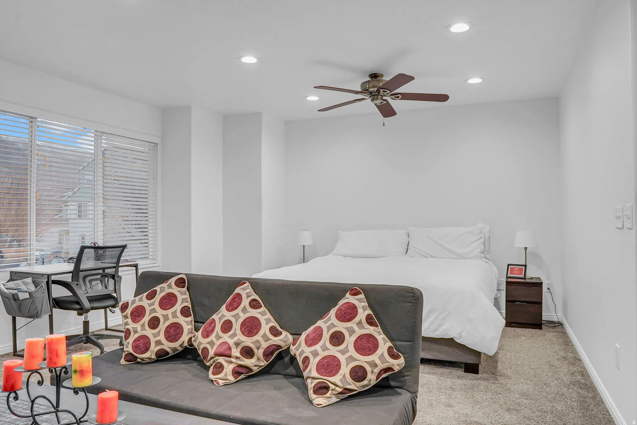 Bedroom with recessed lighting, light carpet, and a ceiling fan