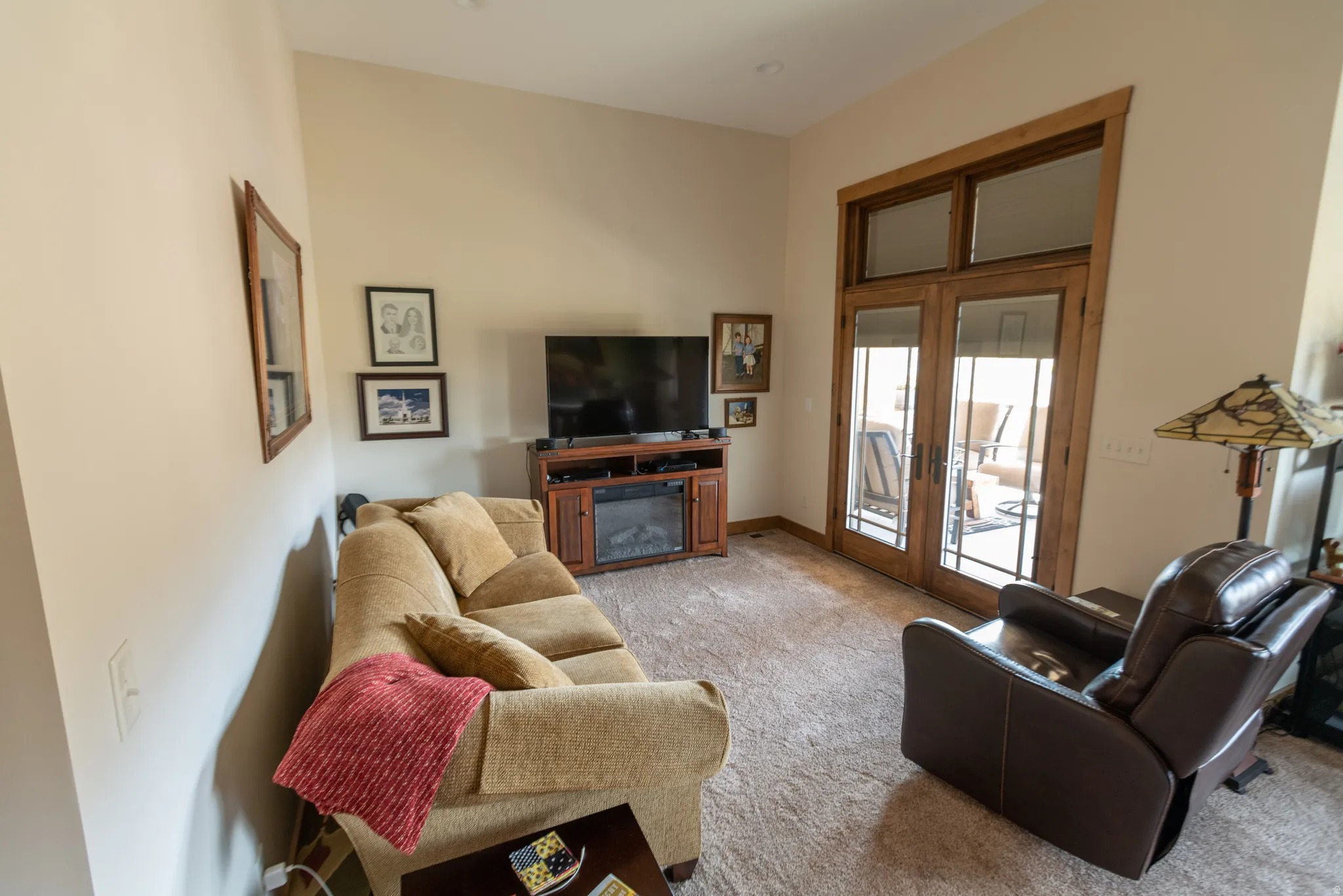 Living room with light colored carpet