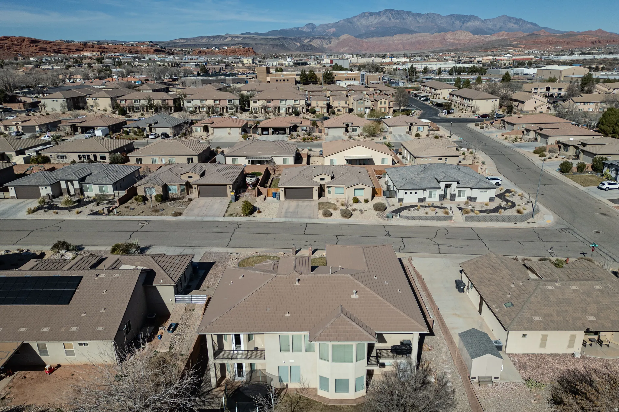 Aerial perspective of suburban area featuring mountains