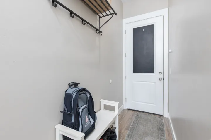Mudroom with wood finished floors