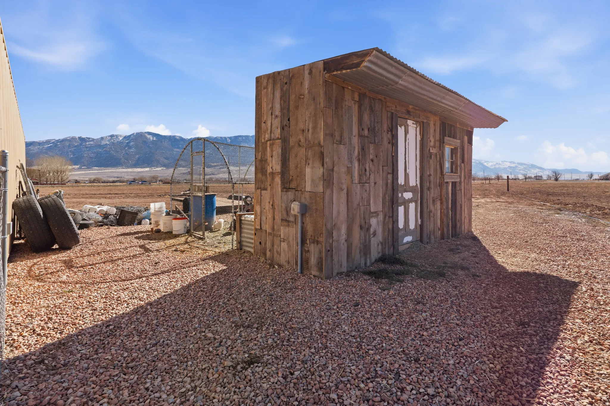 View of shed with a mountain view