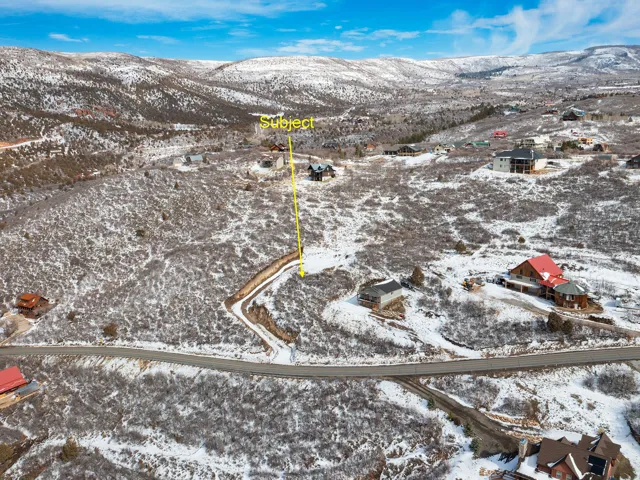 Snowy aerial view with a mountain view