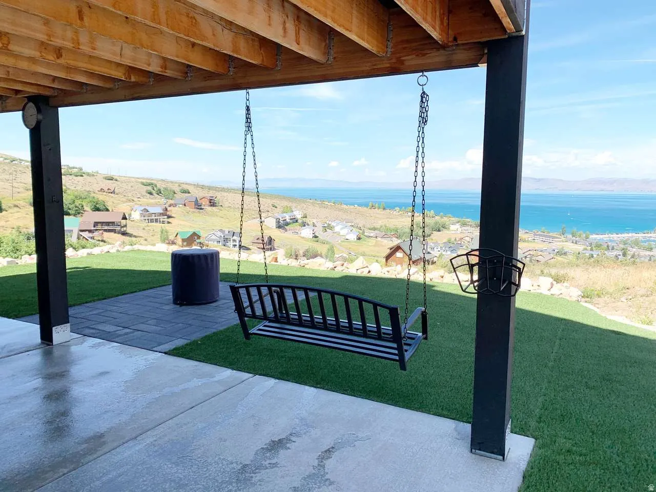 View of patio / terrace featuring a water view