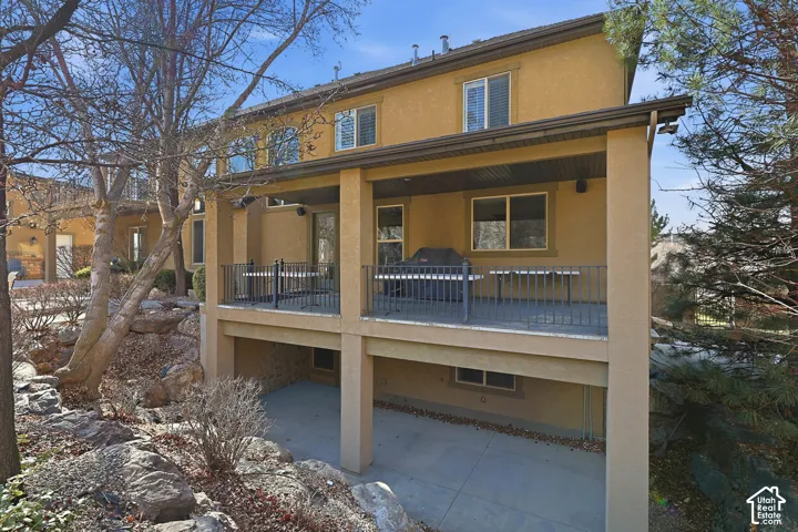 Back of house with stucco siding