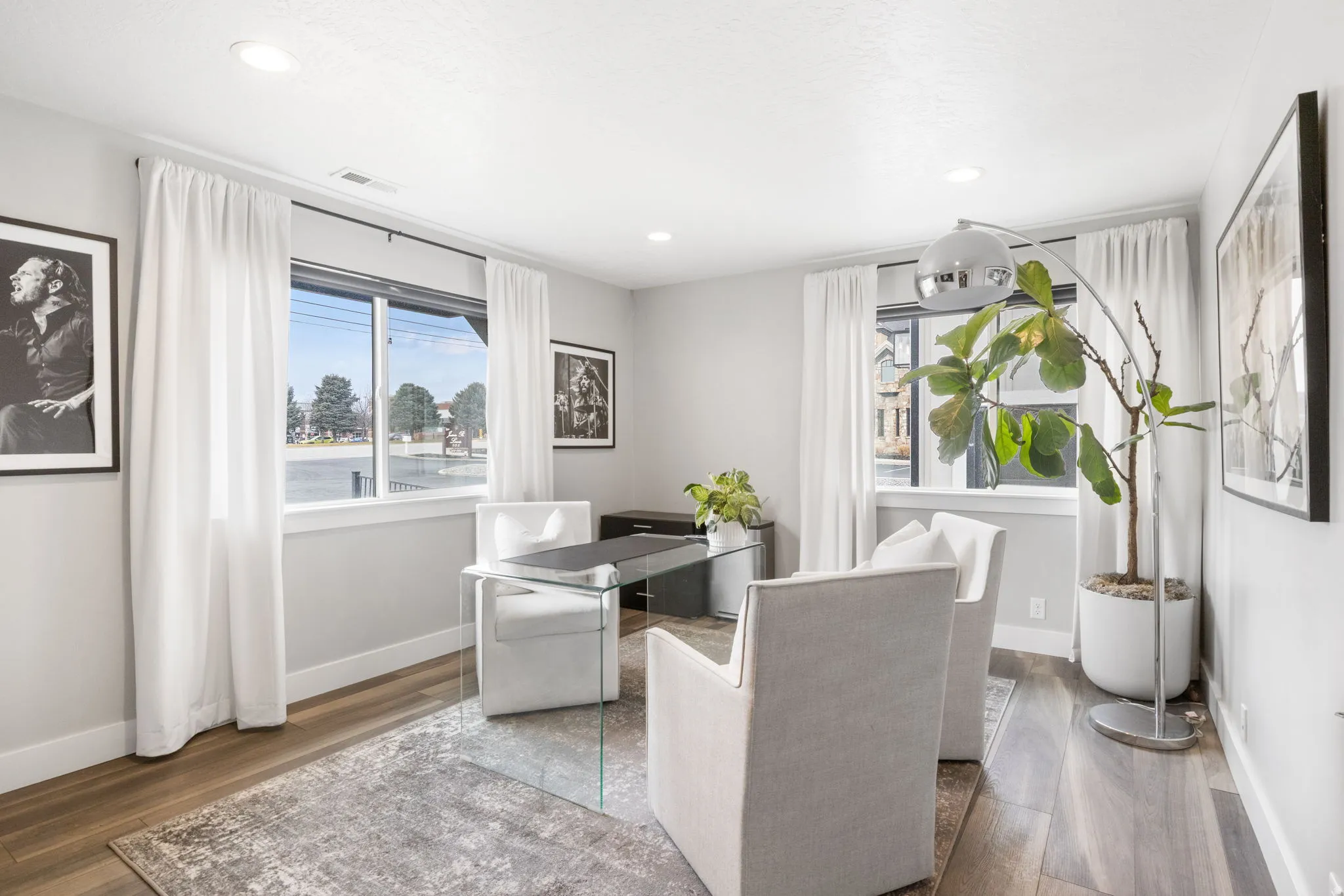 desk, wood finished floors, and recessed lighting