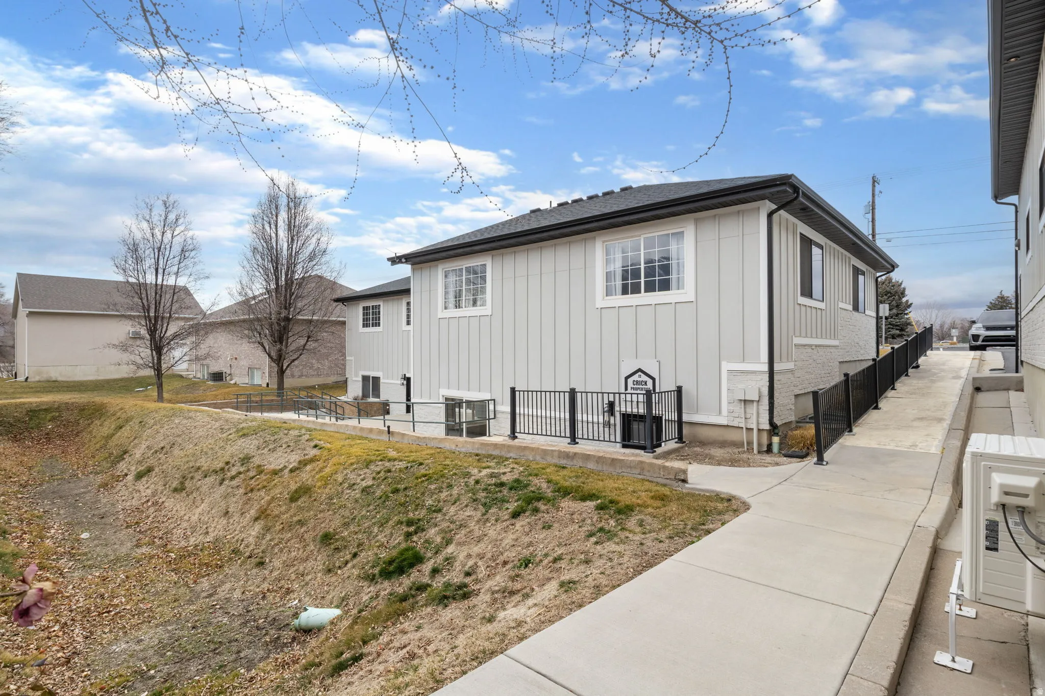 View of side of property with board and batten siding