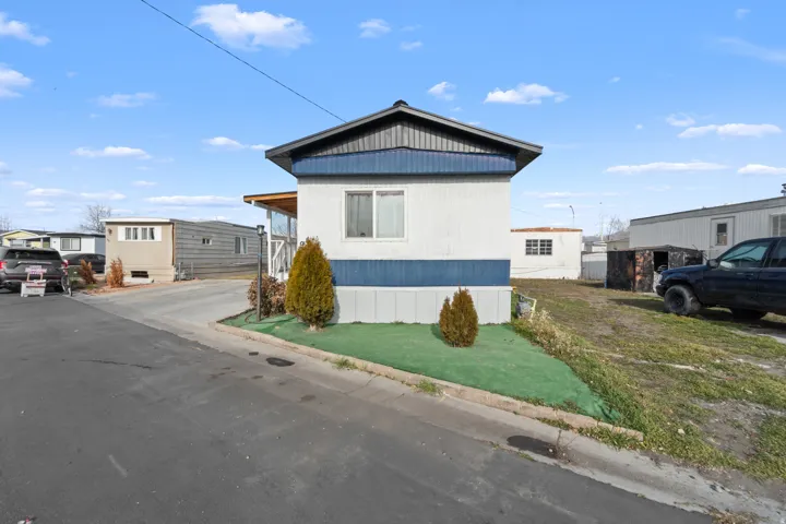 View of front of property with a front lawn
