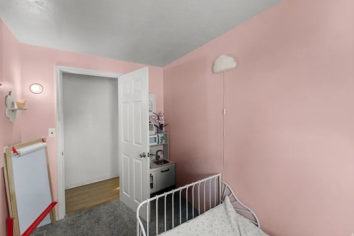 Stairs featuring carpet floors