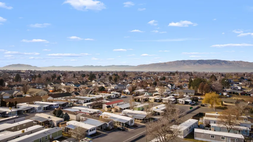 Aerial perspective of suburban area featuring mountains