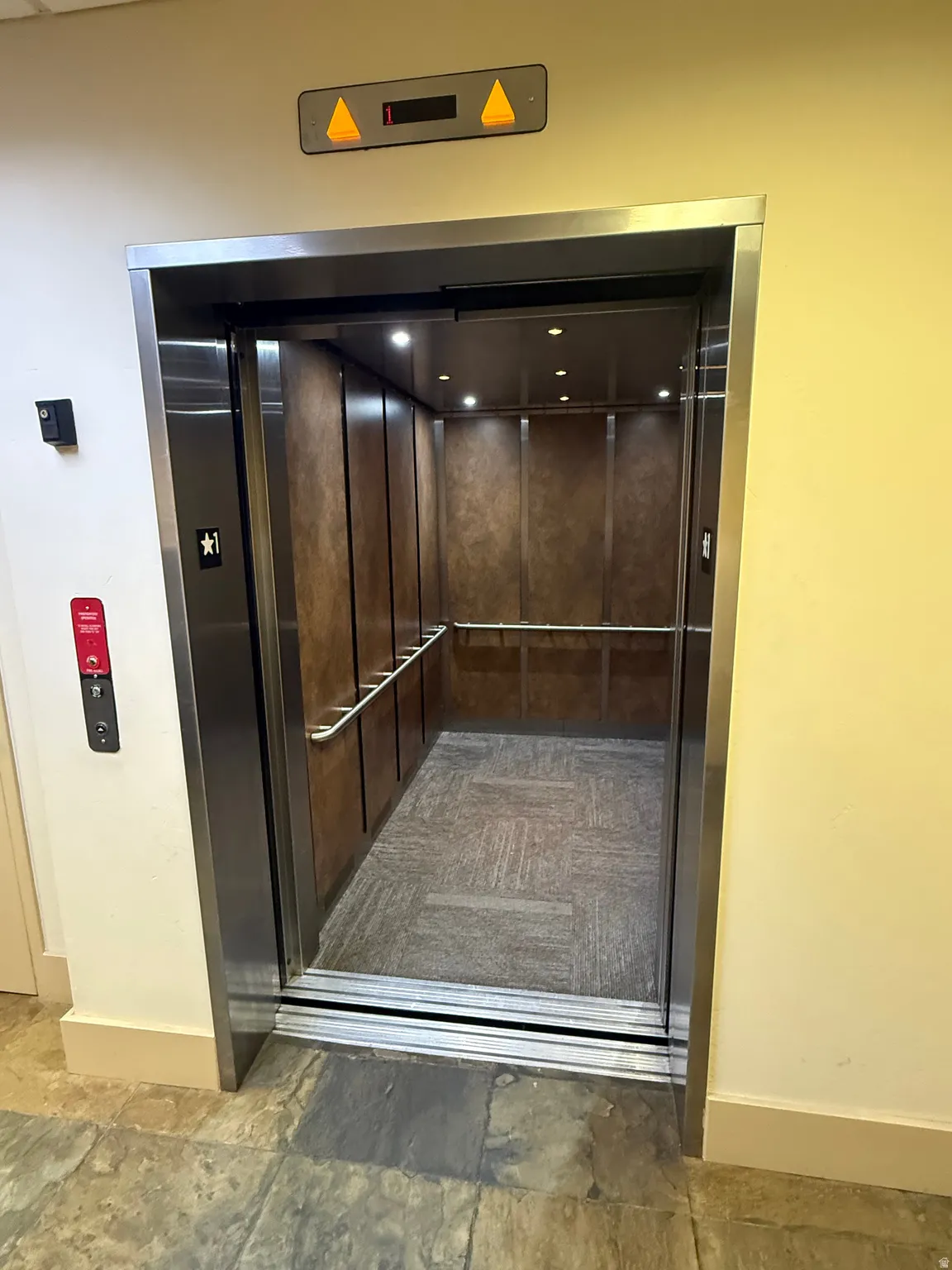 Elevator featuring baseboards