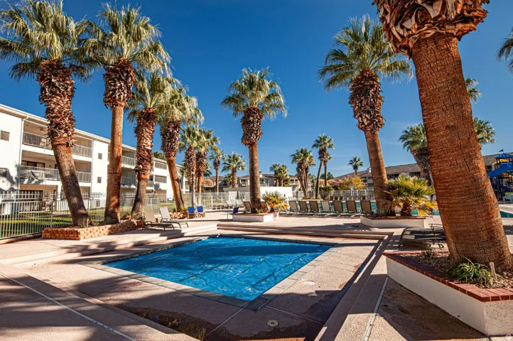 Community pool with a patio area