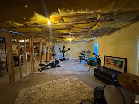 Exercise room with concrete flooring