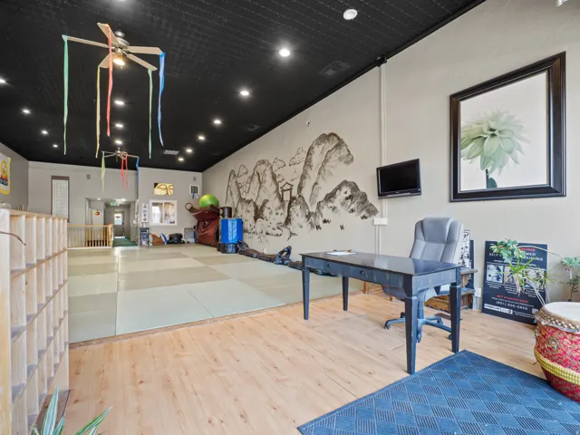 Reception area with a ceiling fan and recessed lighting