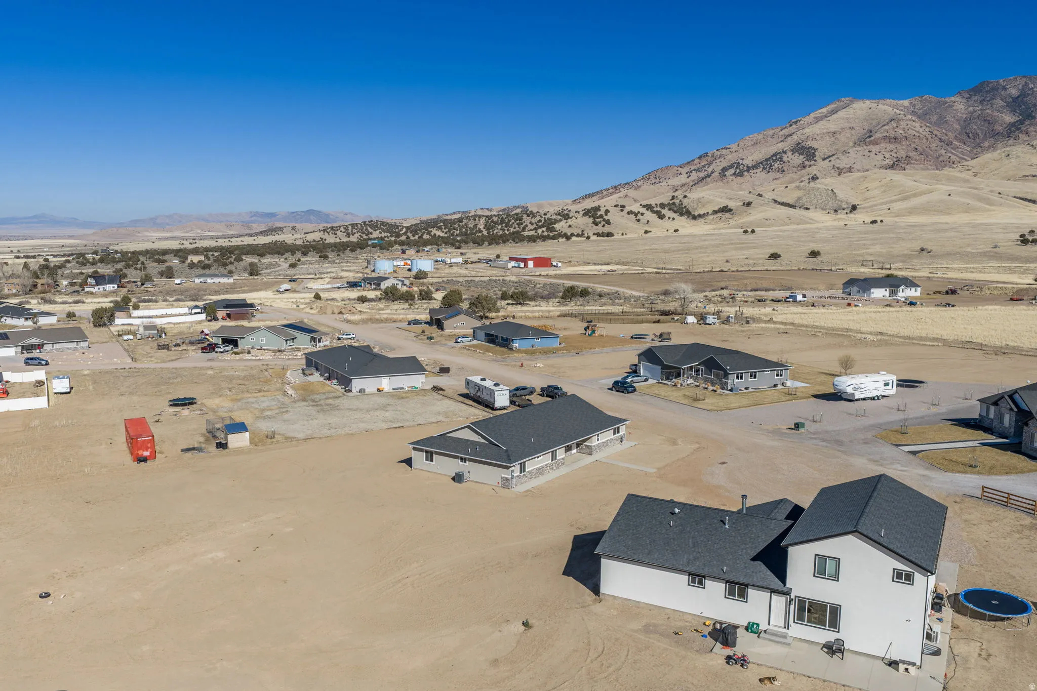 Aerial view of residential area with a mountain backdrop
