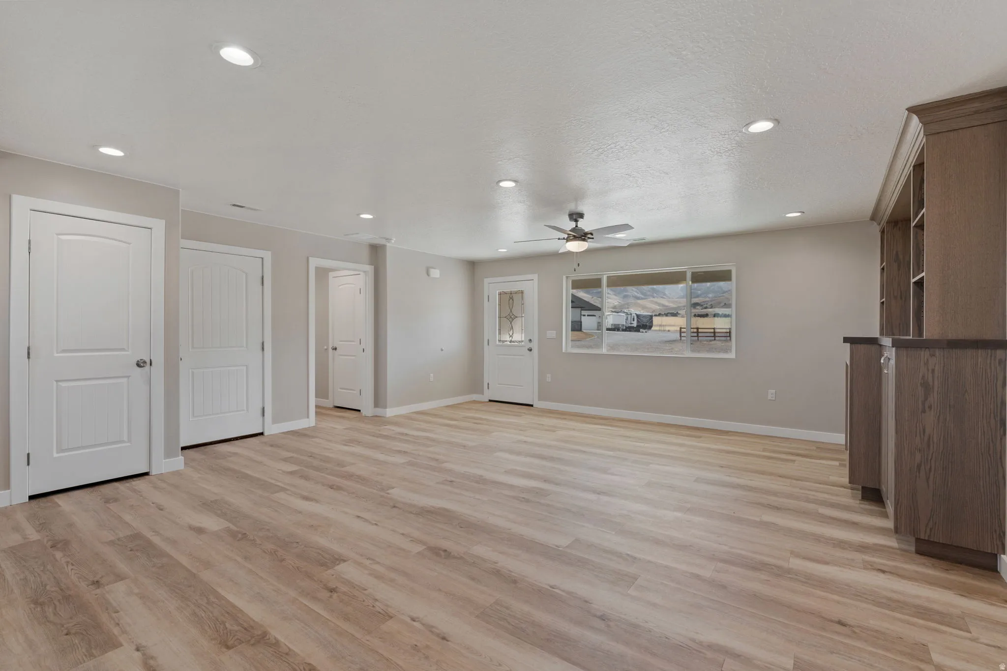 Entry area living room with window facing the mountain views.