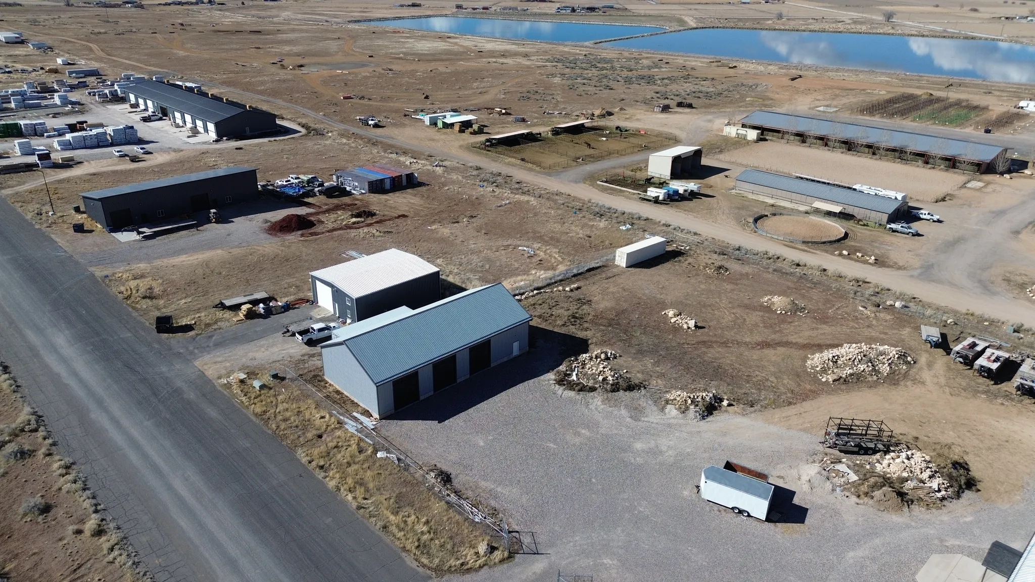 Aerial overview of property's location with a large body of water