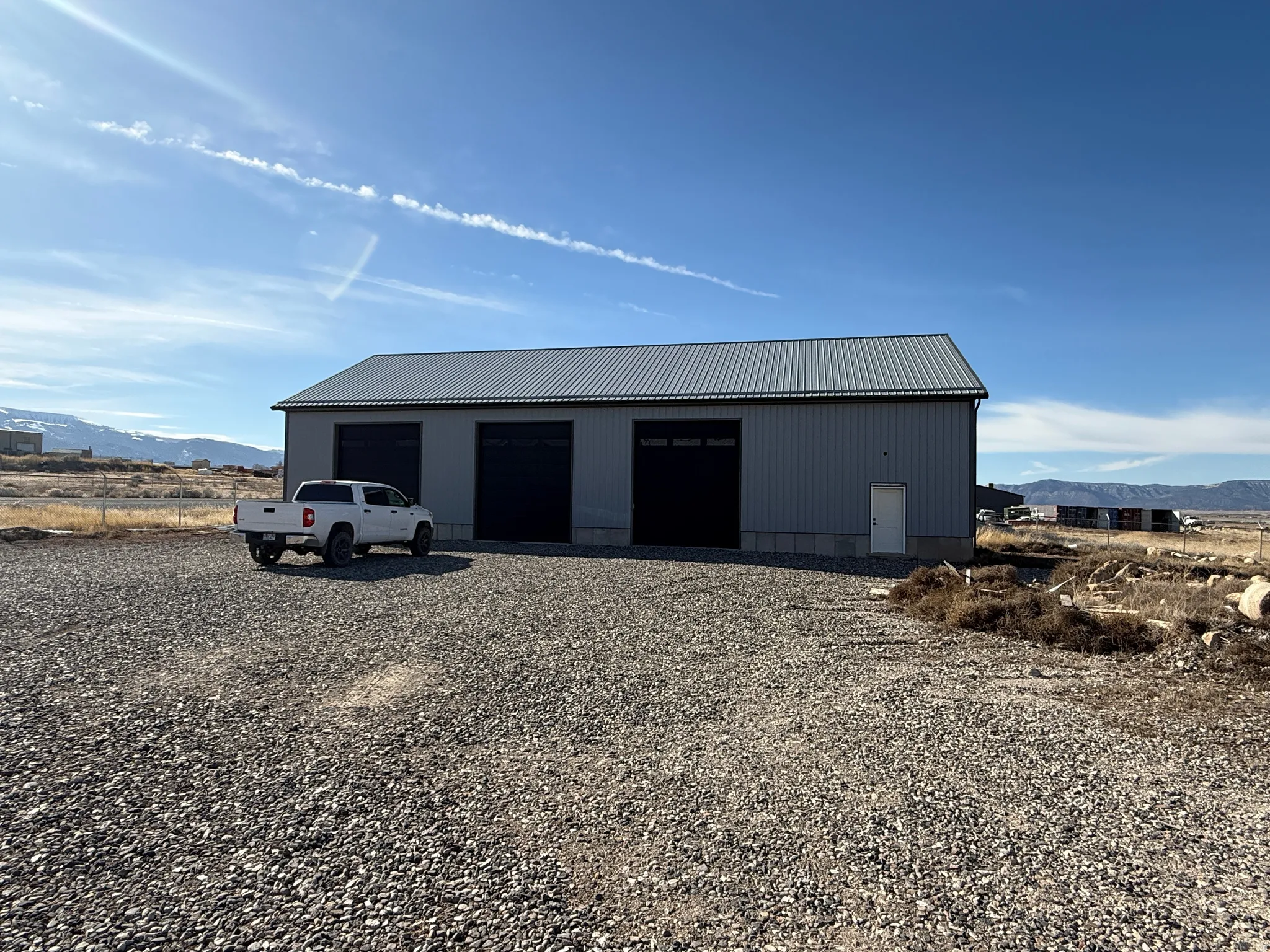 Detached garage featuring a mountain view