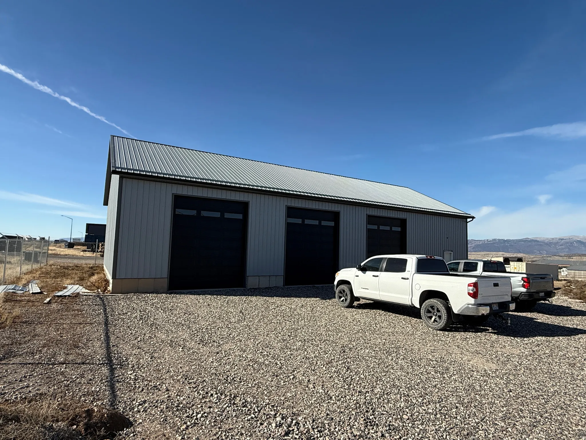 Detached garage with a mountain view