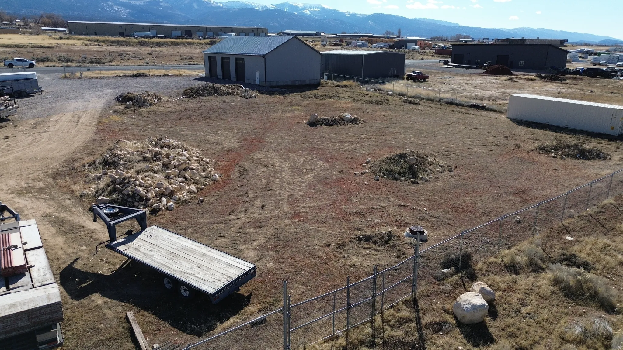 View of yard with a mountain view and an outbuilding