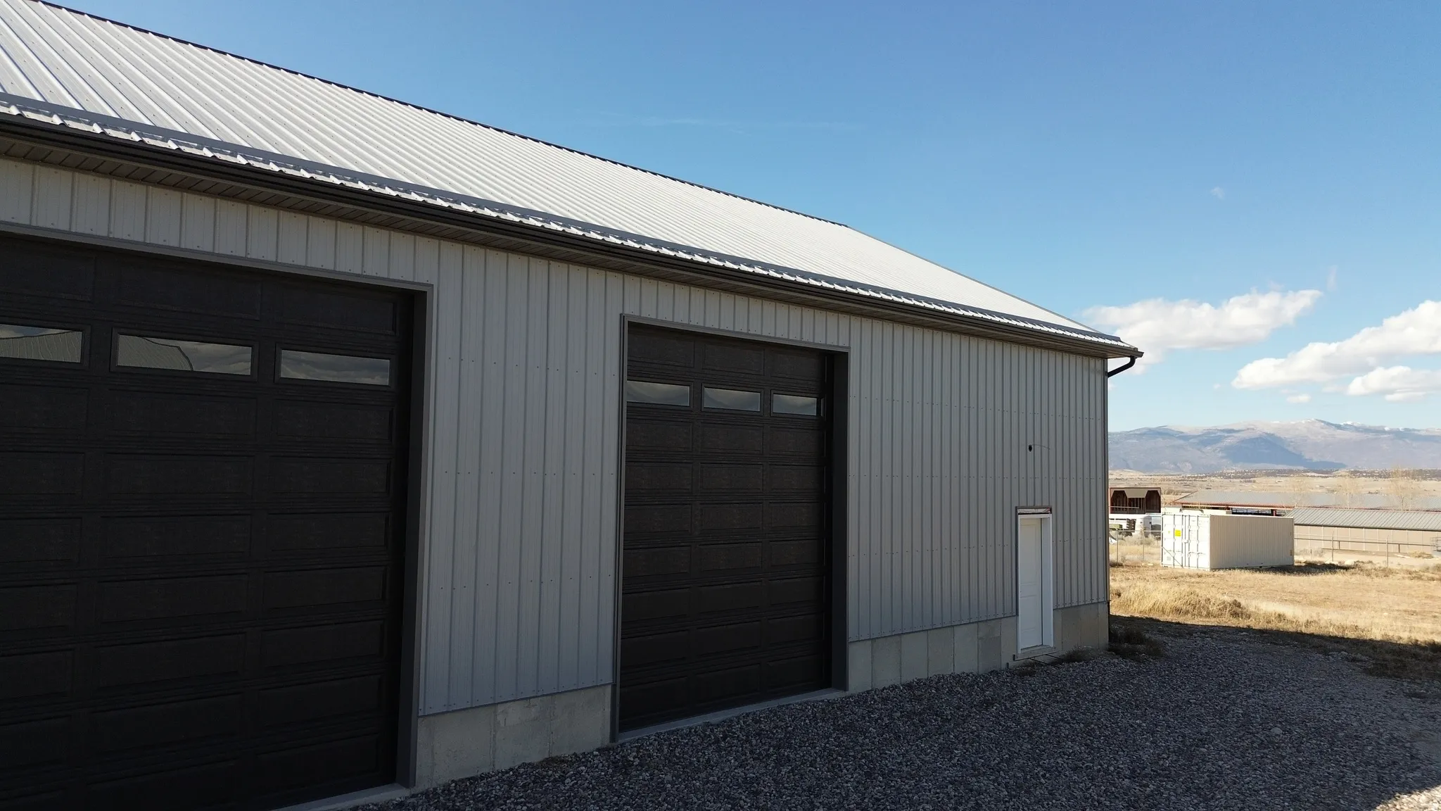 Garage featuring a mountain view