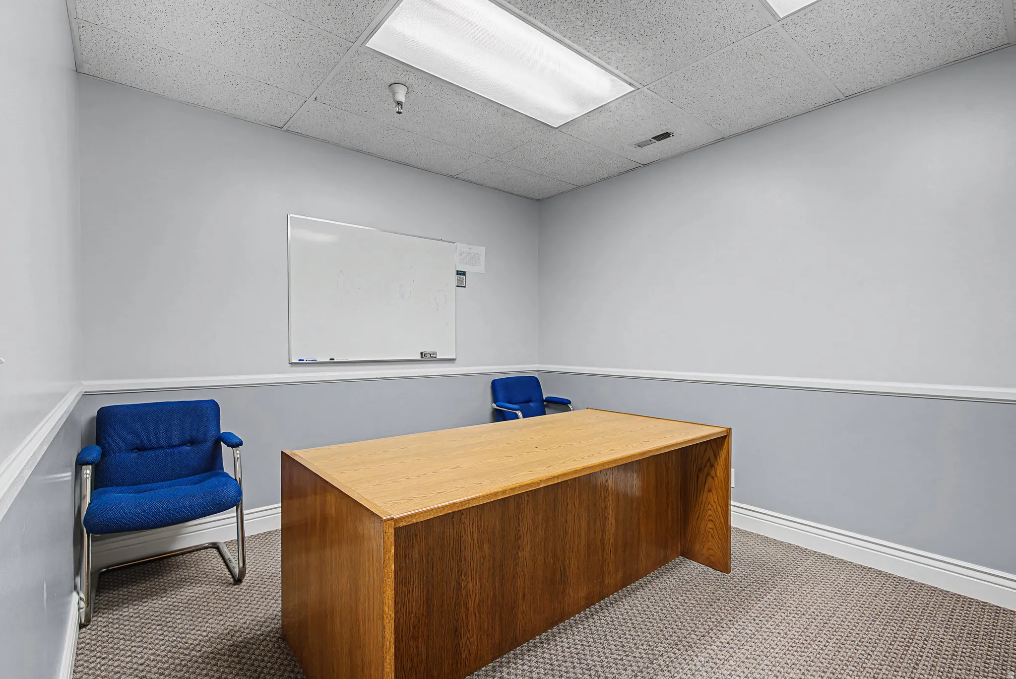 Office area featuring a drop ceiling