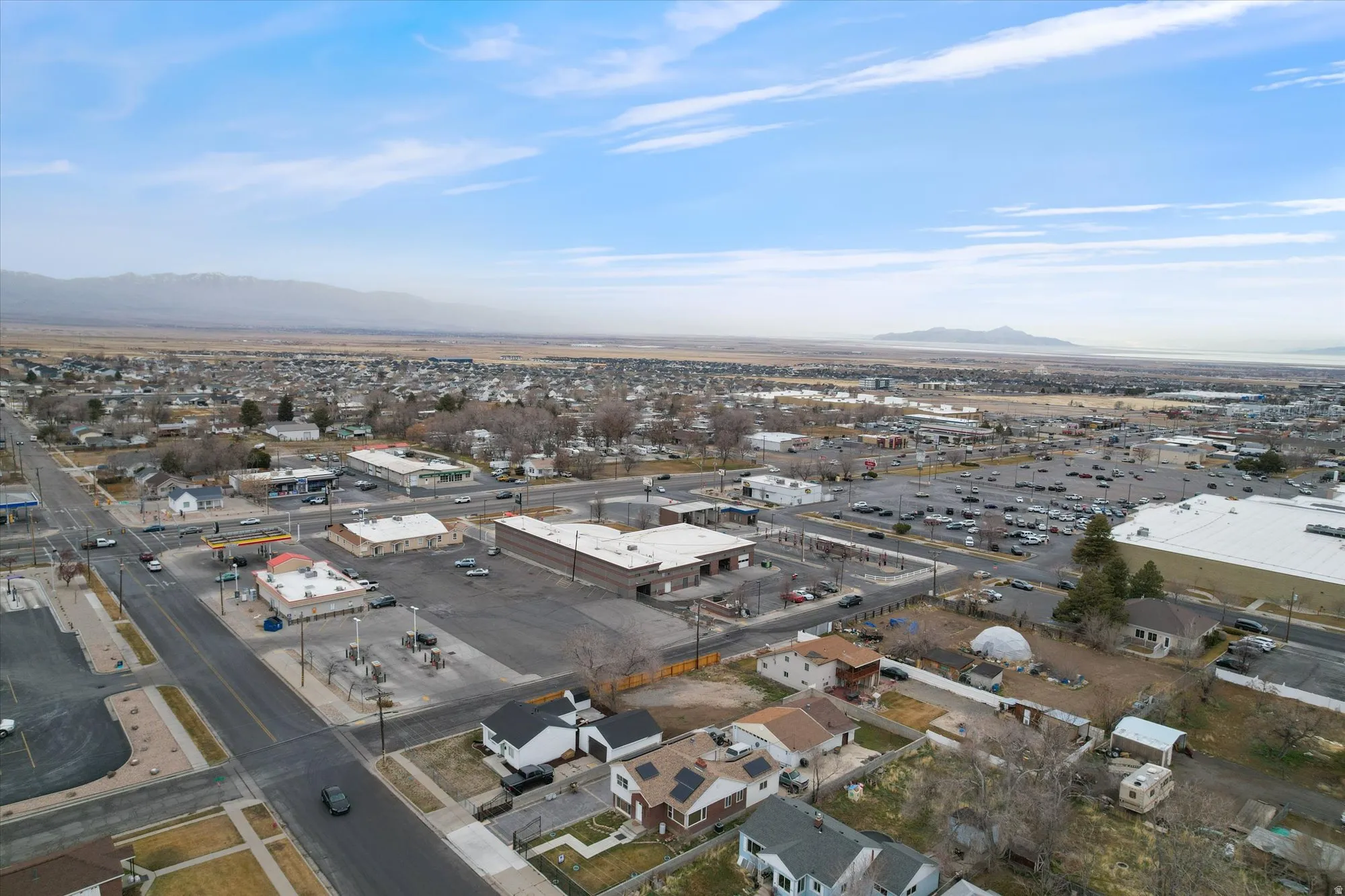 View of property location featuring mountains and an industrial area