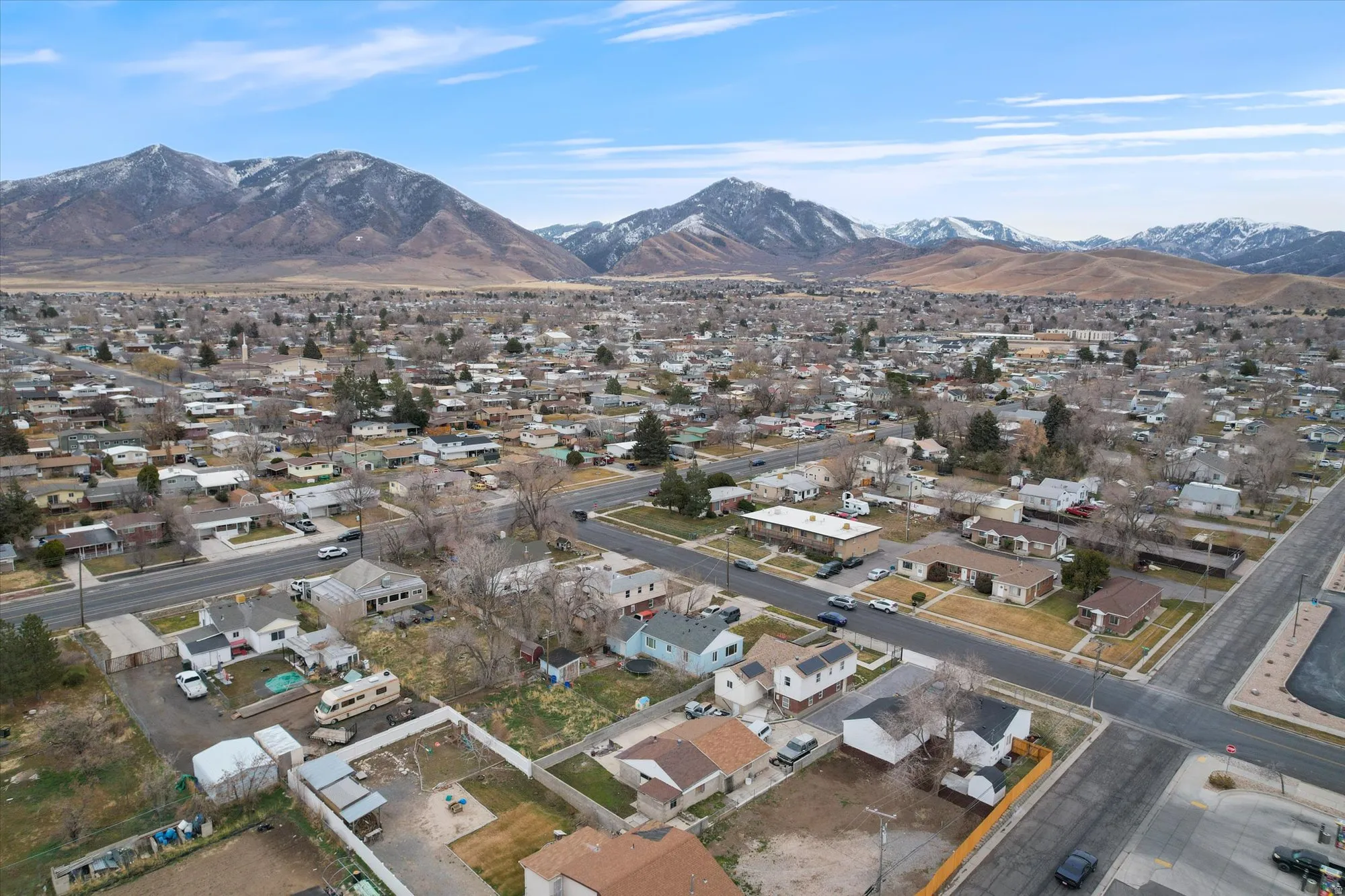 Aerial view of residential area featuring mountains