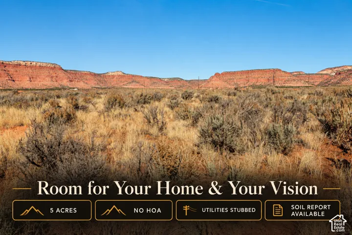 Five-acre parcel of land featuring desert terrain, native vegetation, and prominent red rock mesa formations