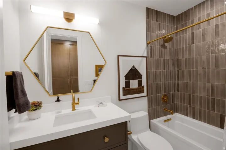 Full bathroom with  shower combination and vanity