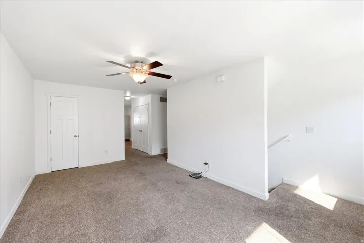 Neutral-toned carpeting throughout