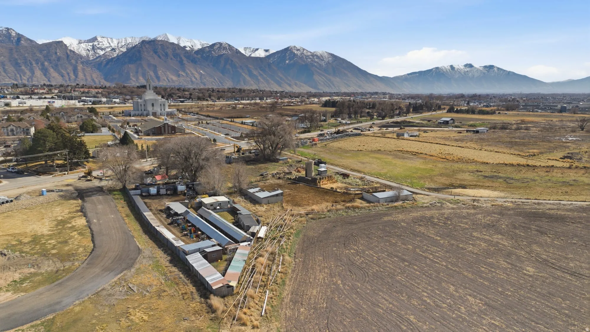 Overview of rural landscape featuring a mountain backdrop