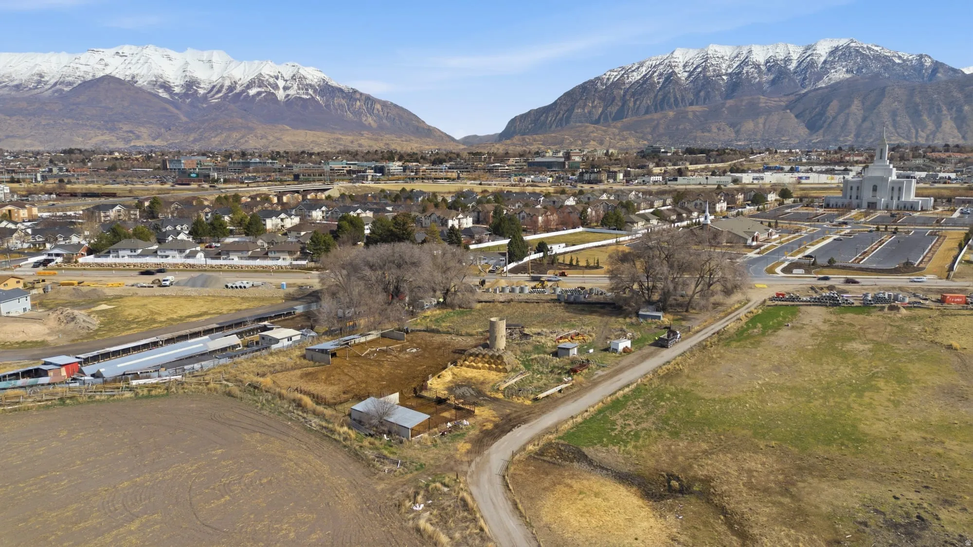 Aerial view of residential area featuring mountains