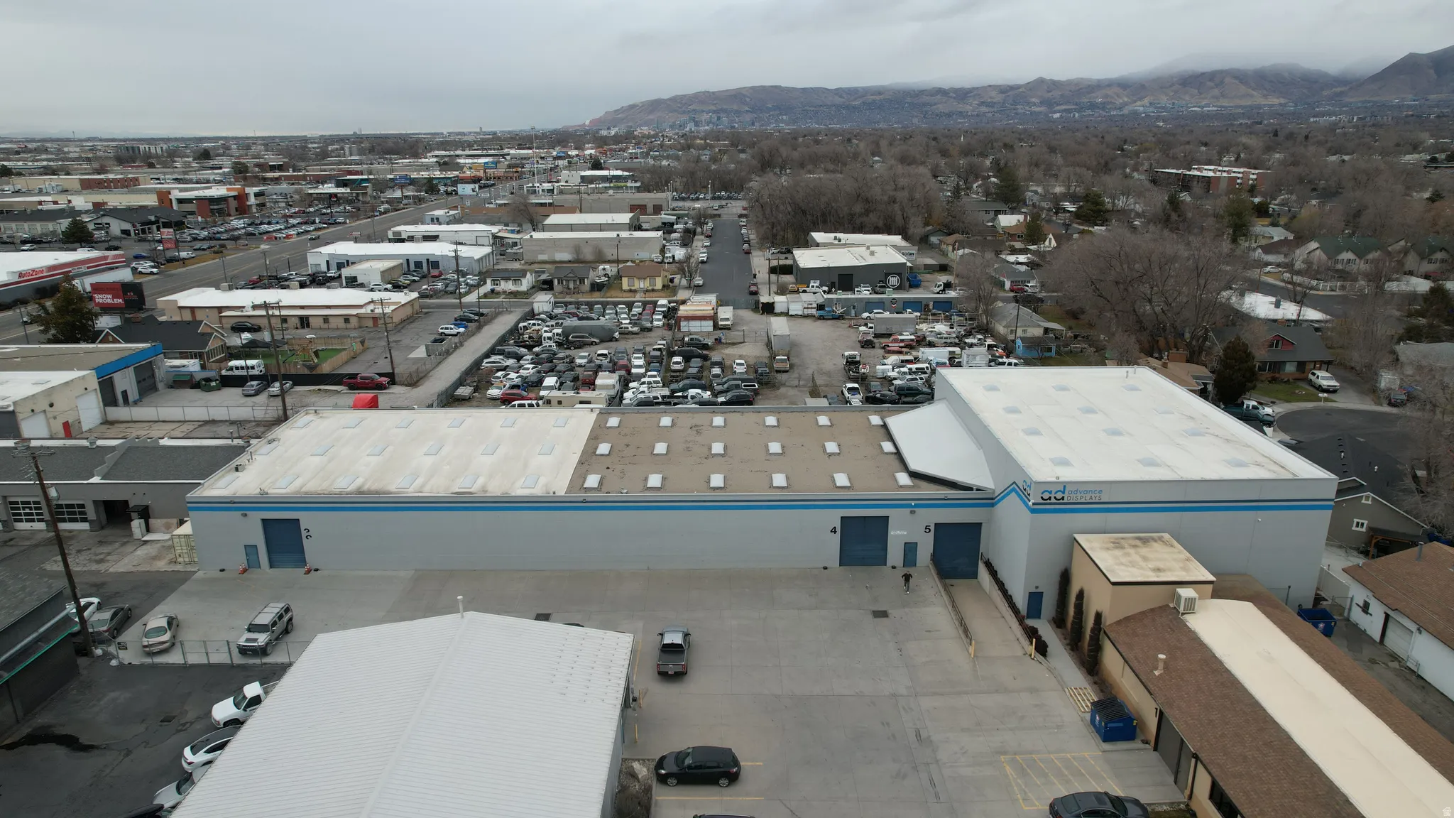 Aerial view of mountains and an industrial area