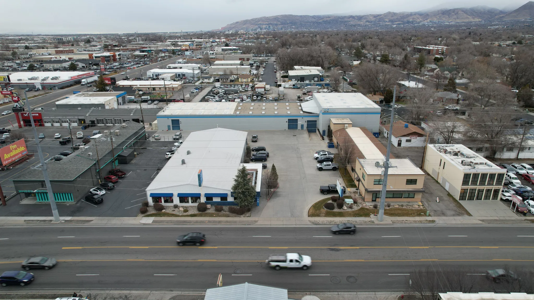 Bird's eye view of a commercial area and mountains
