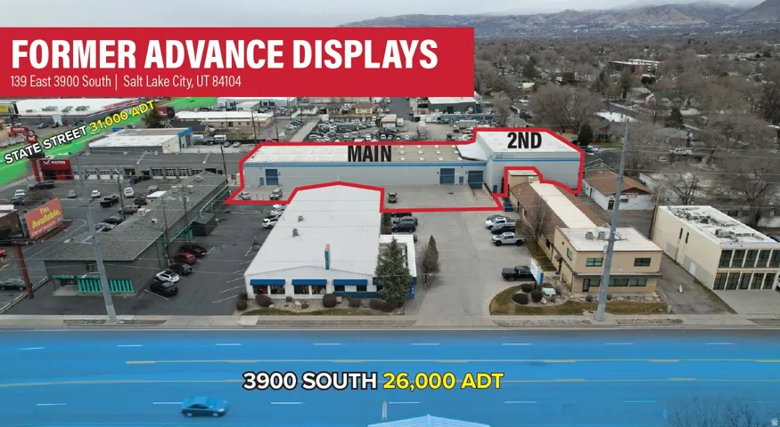 View of property location featuring property parcel outlined and a commercial area