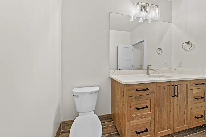 Bathroom with toilet and vanity