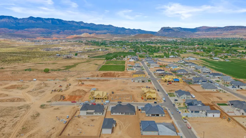 Aerial view of residential area with a mountain backdrop