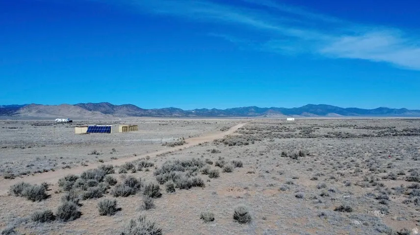 View of mountain backdrop featuring a desert landscape