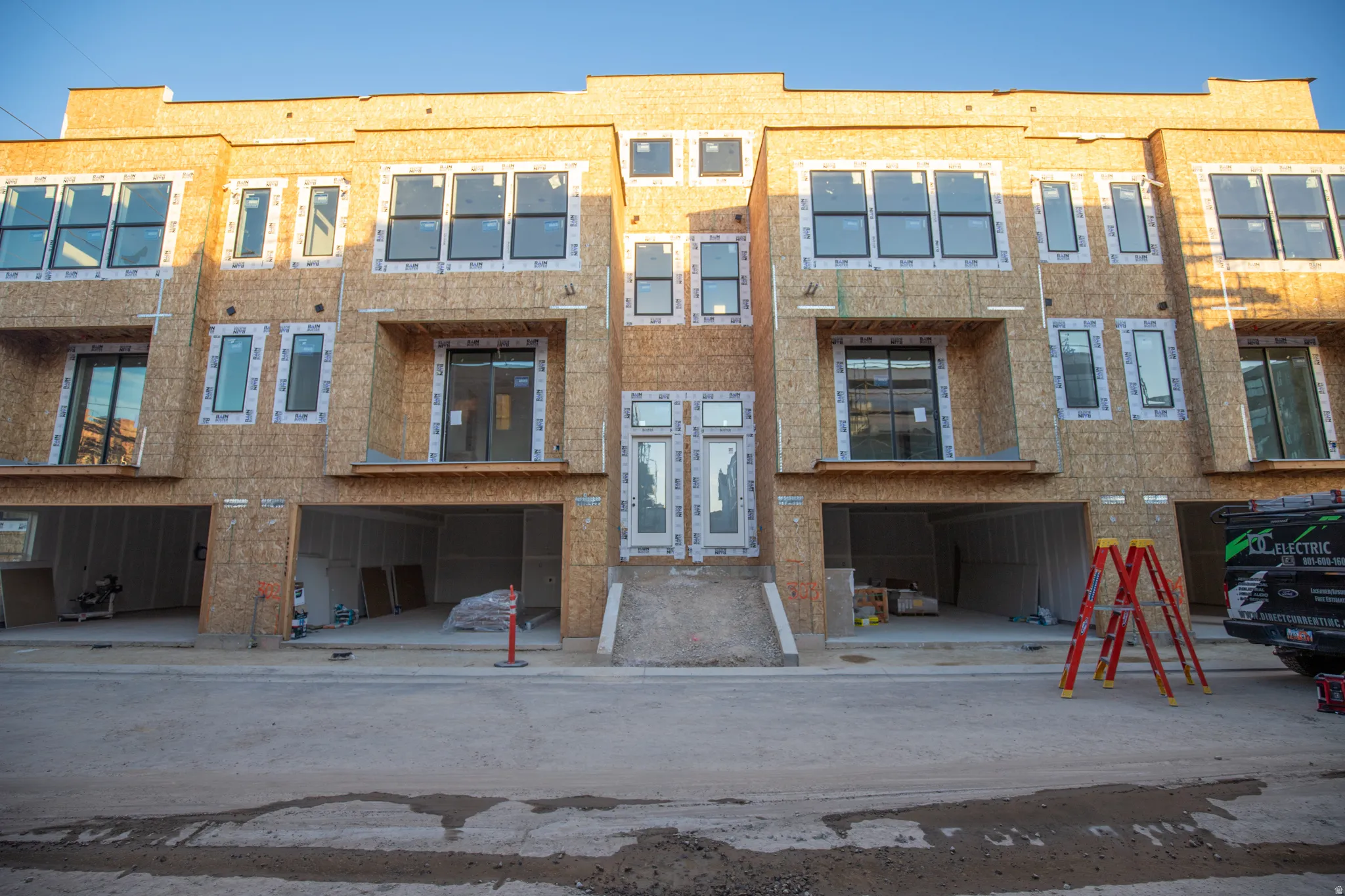 View of property with a garage