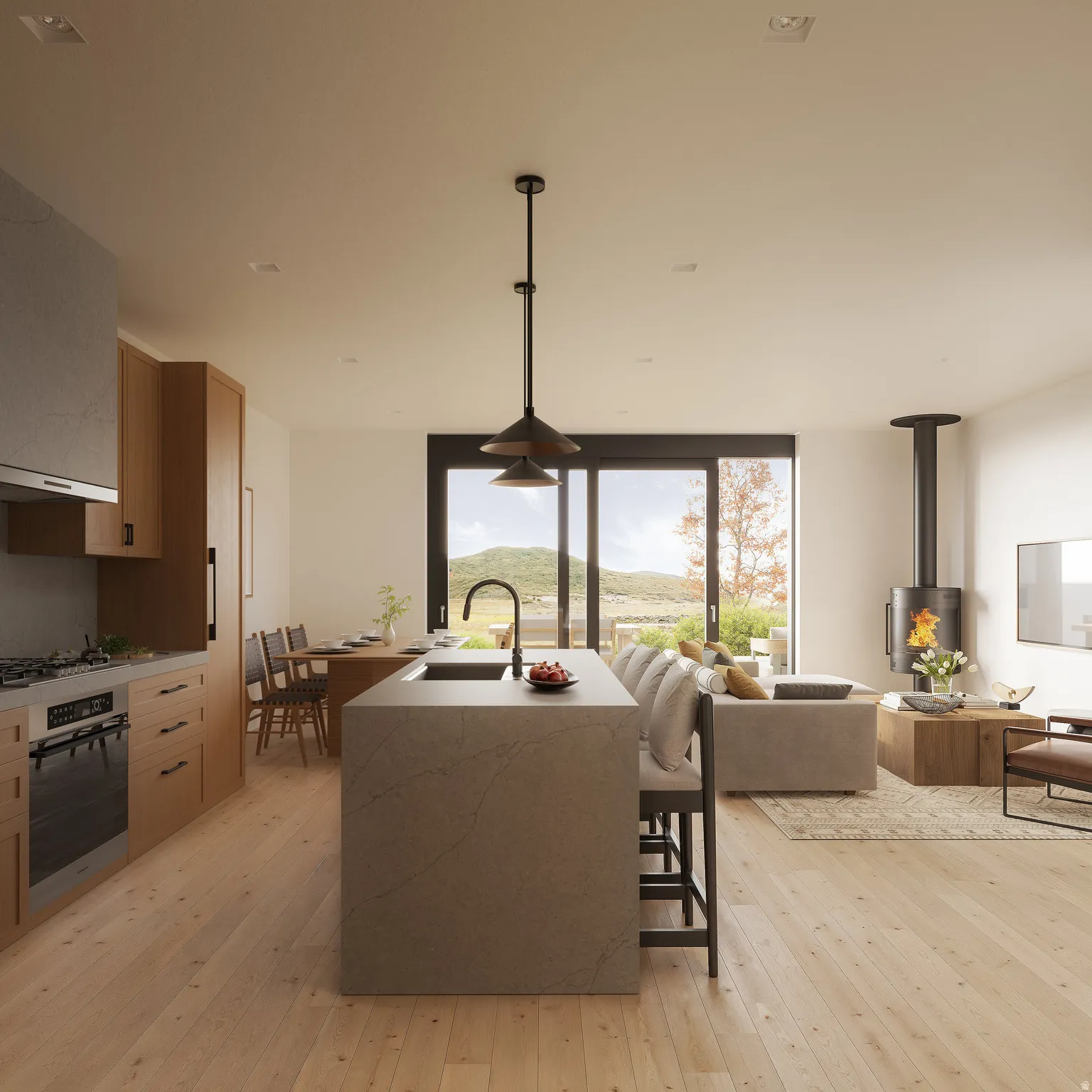 Kitchen with a wood stove, floor to ceiling windows, stainless steel appliances, light stone counters, and light wood finished floors