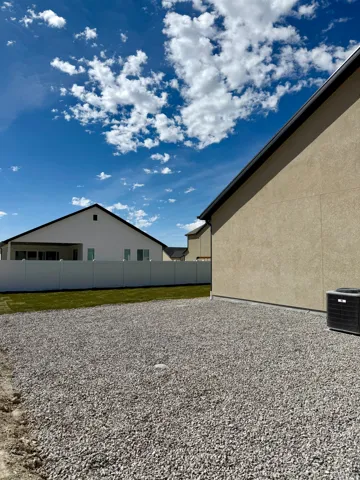 Expansive gravel and grass outdoor space