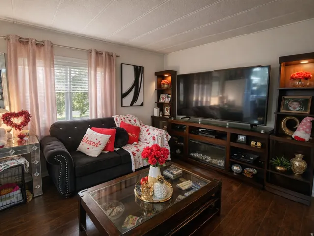Living room with hardwood / wood-style floors